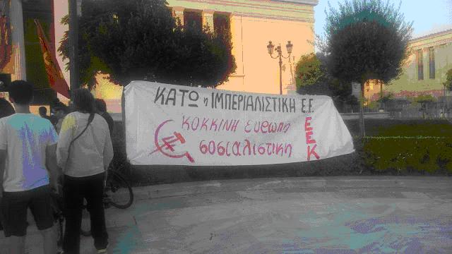 EEK banner at rally. 'Down with Imperialism!' 'For a Red Socialist Europe!' EEK banner at rally. 'Down with Imperialism!' 'For a Red Socialist Europe!'